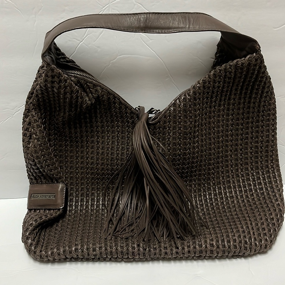 Elisa Atheniense Slouch Shoulder Bag with Tassels on Zippers.